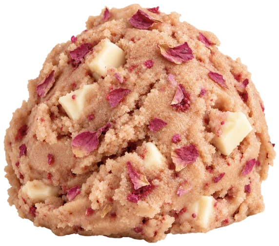 A scoop of Rose Gold cookie dough with rose petals and white chocolate